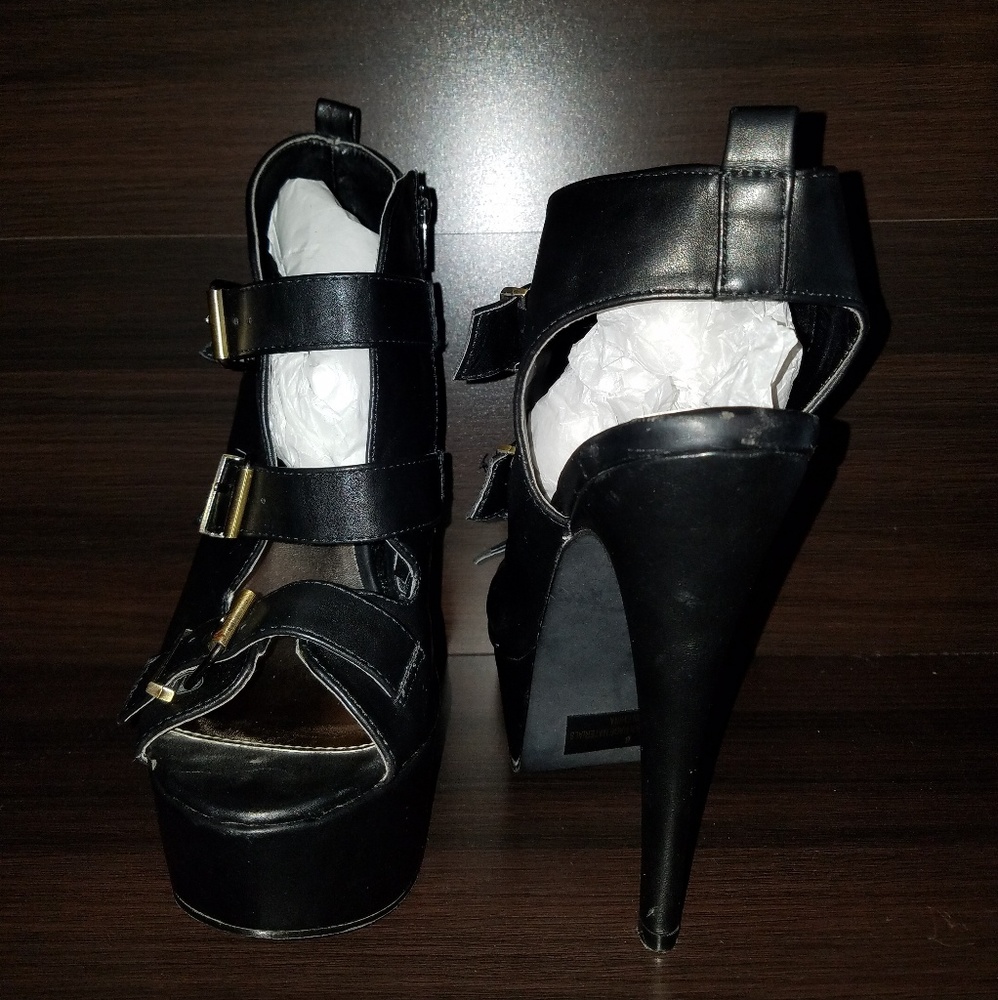 Size 8, black open toe and heel, worn once.